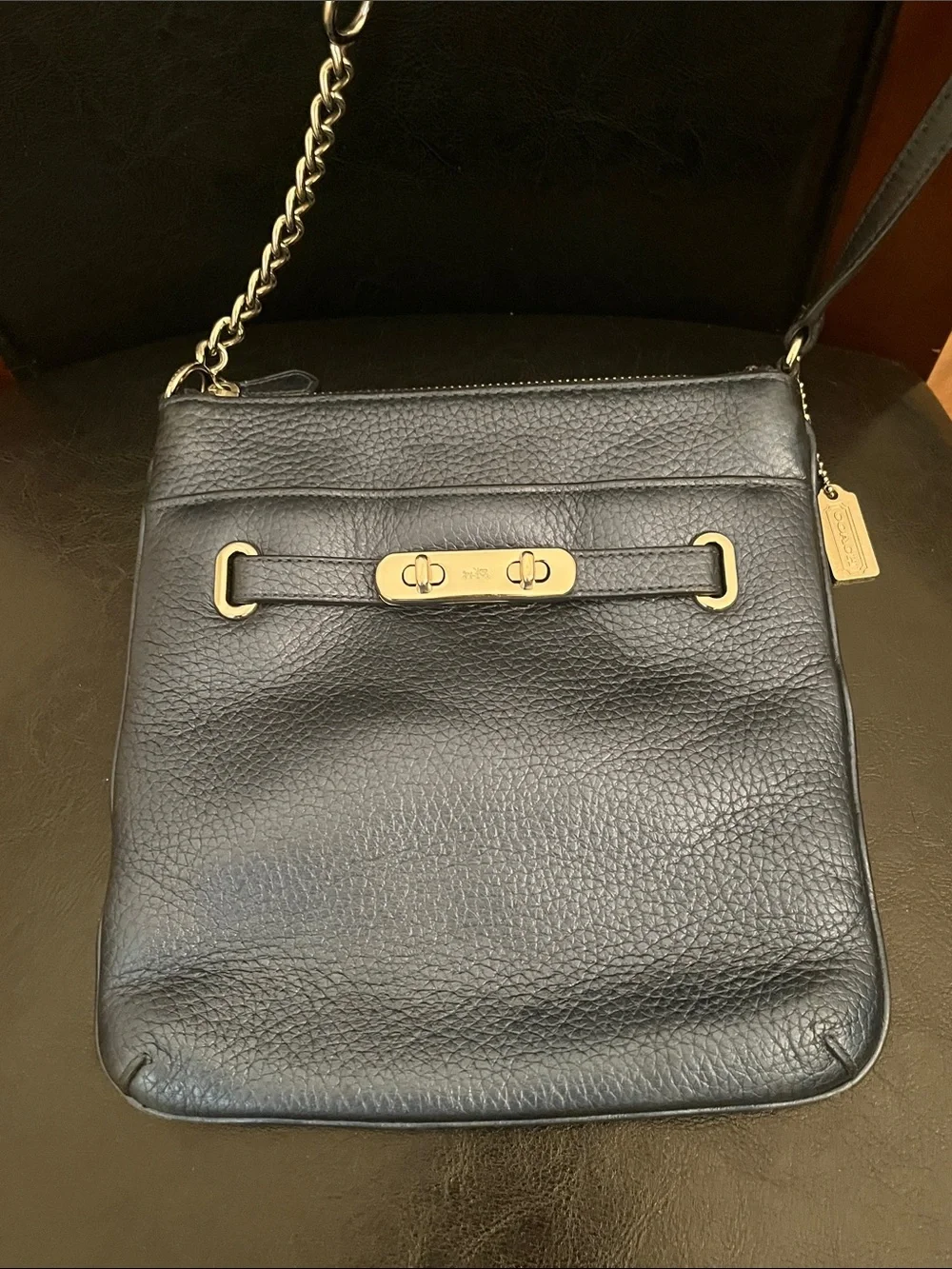 Metallic blue Coach crossbody purse